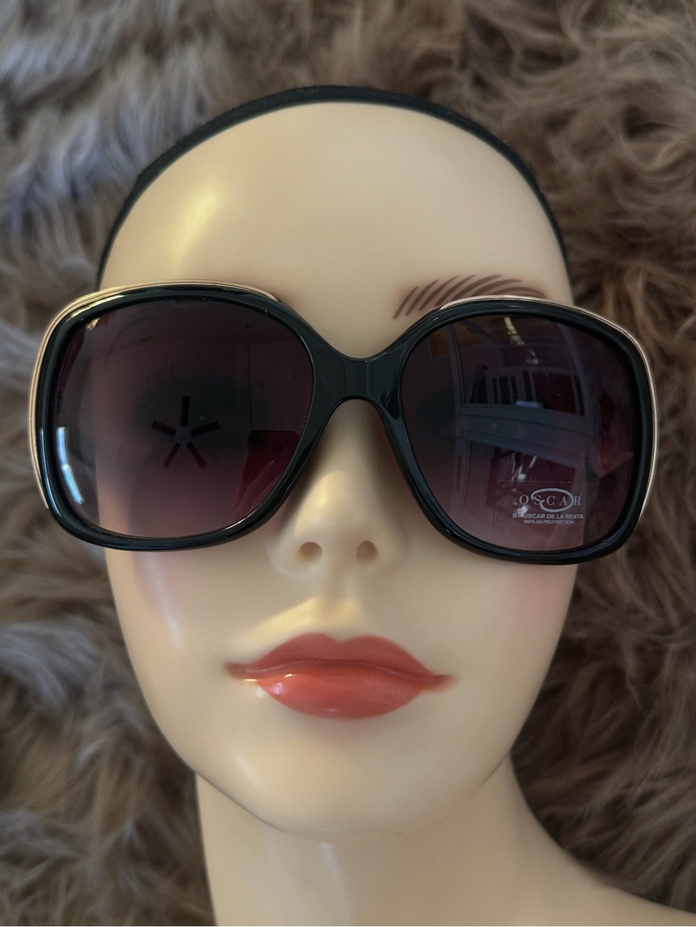 Oscar de la Renta sunglasses